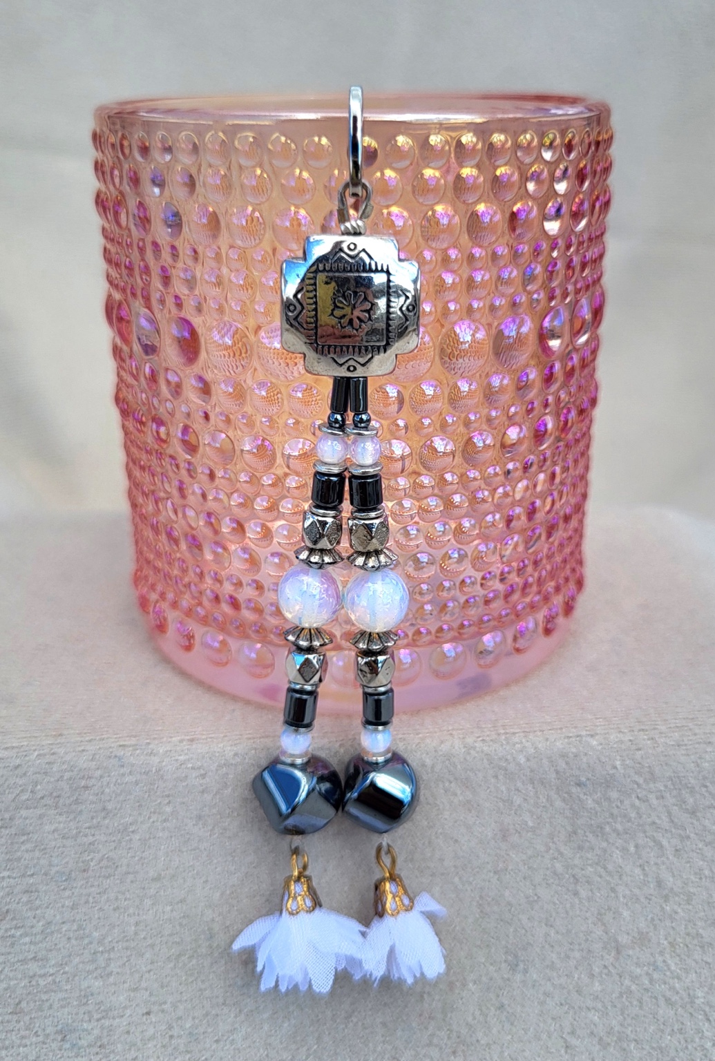 Long silver stamped earrings with opal beads, hematite and white fabric tassels